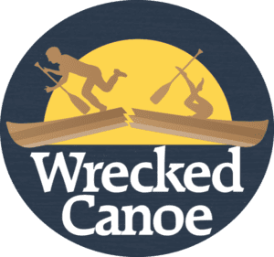 A logo of two people in canoe on the water.