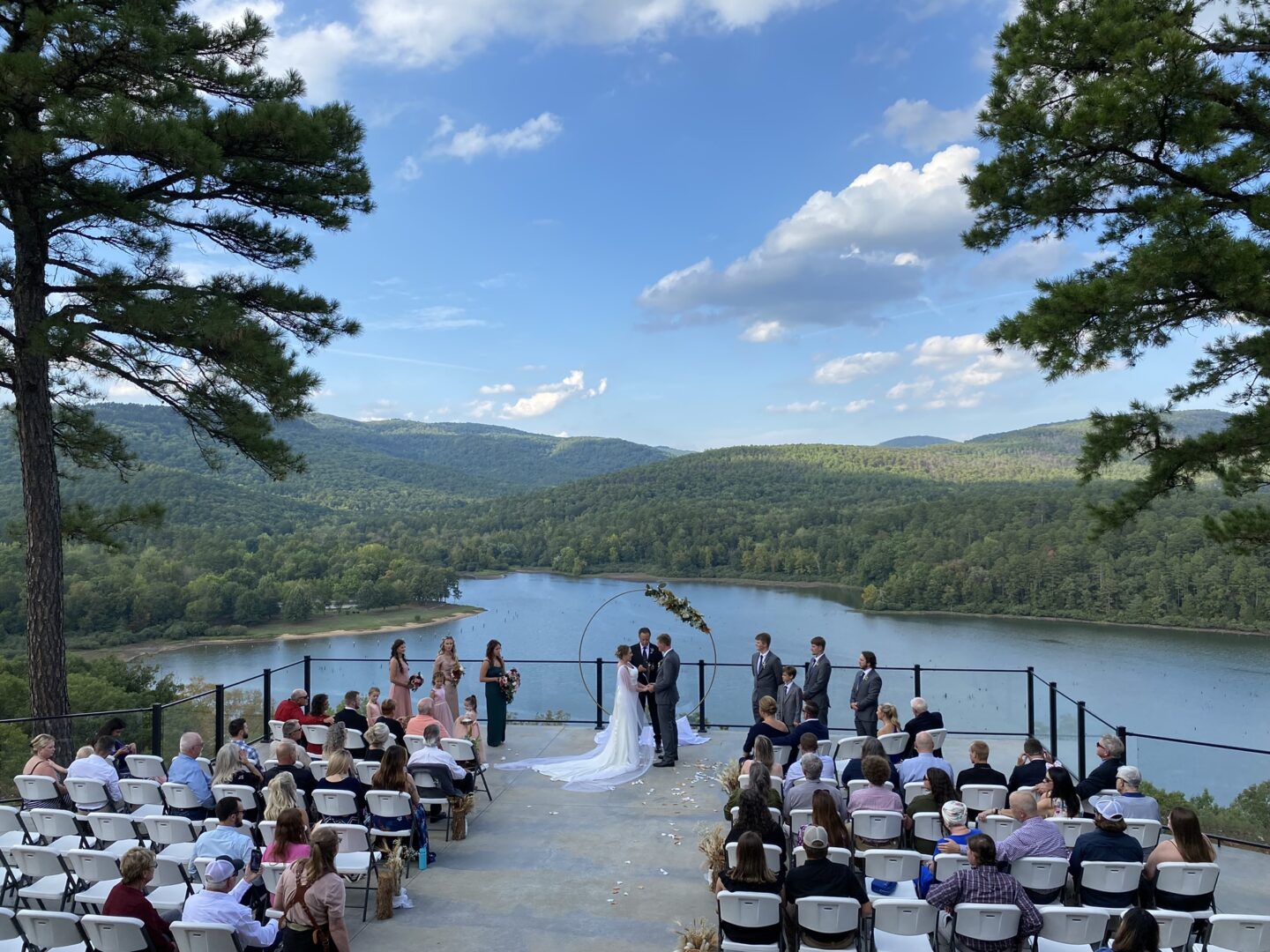 A wedding ceremony with a view of the water.