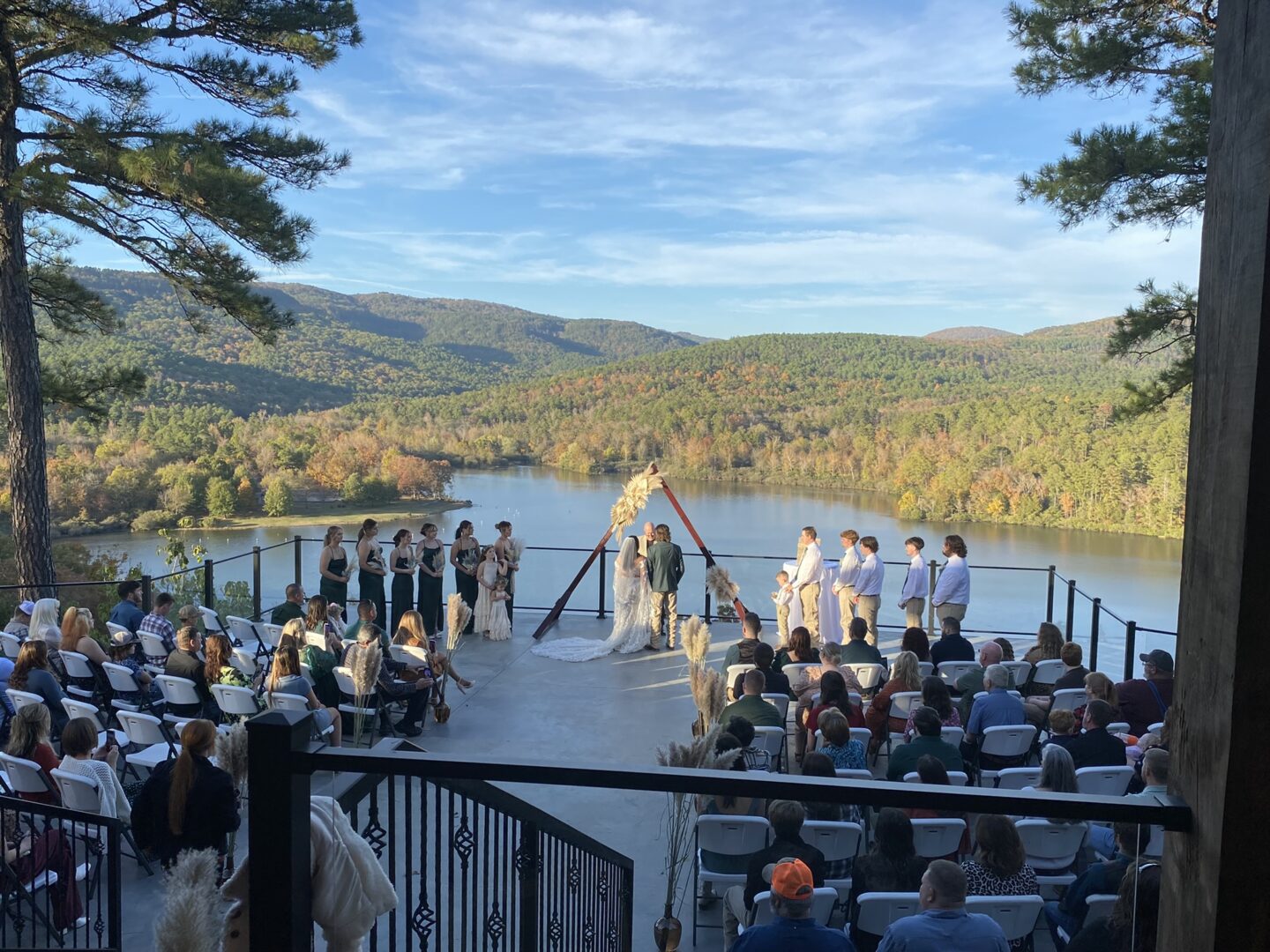 A wedding ceremony on the deck of a boat.