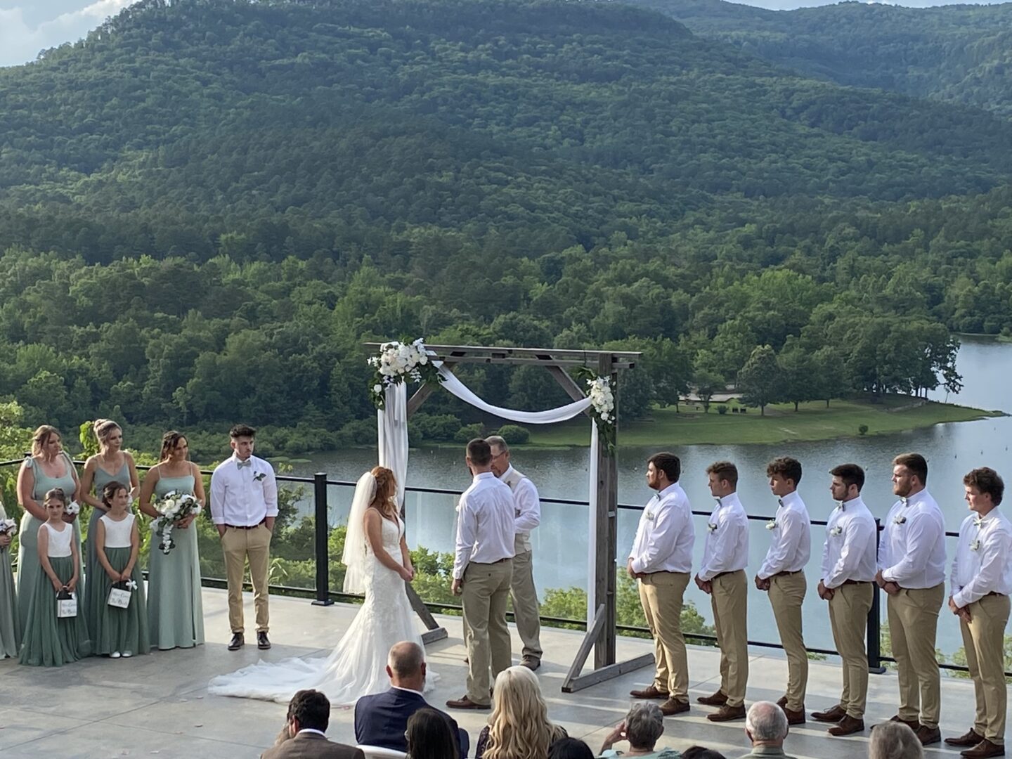 A wedding ceremony with a view of the mountains.