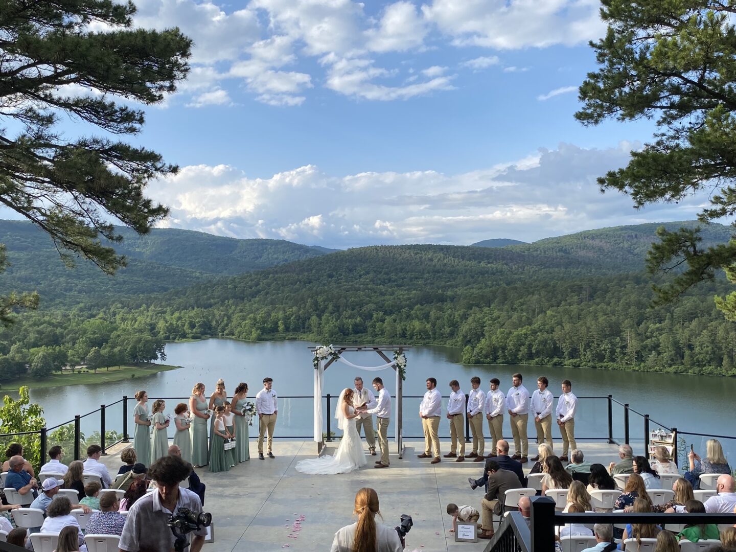 A wedding ceremony with a view of the lake.