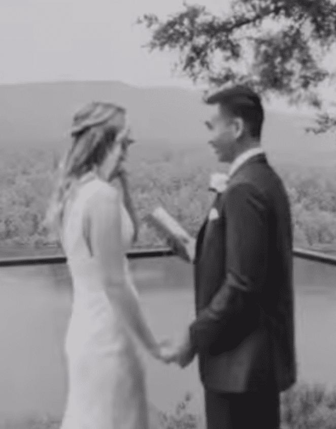 The Reverse Bouquet Toss: Guests Toss Flowers Back to the Couple with Good Wishes